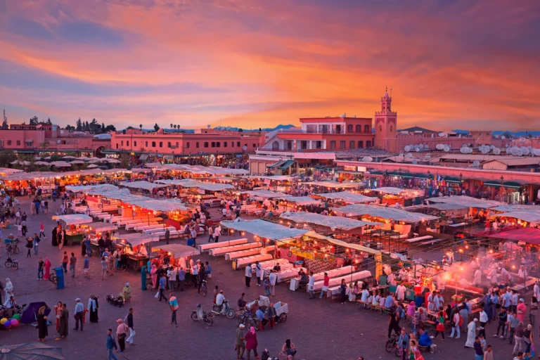 Jemaa el-Fna square and Koutoubia Mosque in Marrakech at sunset